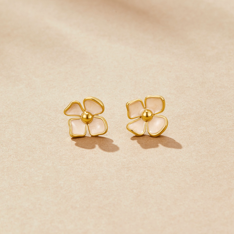 Greta – Cercei rotunzi cu design floral.